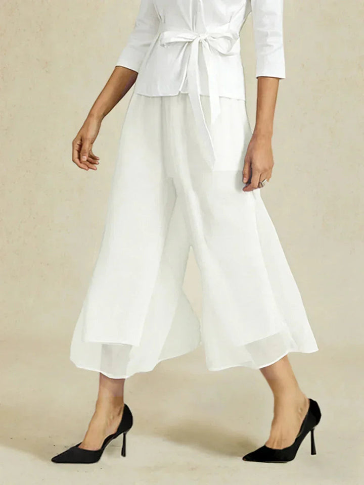 Pantaloni a gamba dritta con lunghezza cropped e sovrapposizione in chiffon
