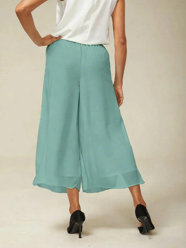 Pantaloni a gamba dritta con lunghezza cropped e sovrapposizione in chiffon