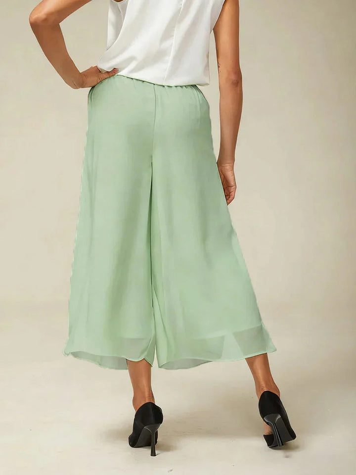 Pantaloni a gamba dritta con lunghezza cropped e sovrapposizione in chiffon
