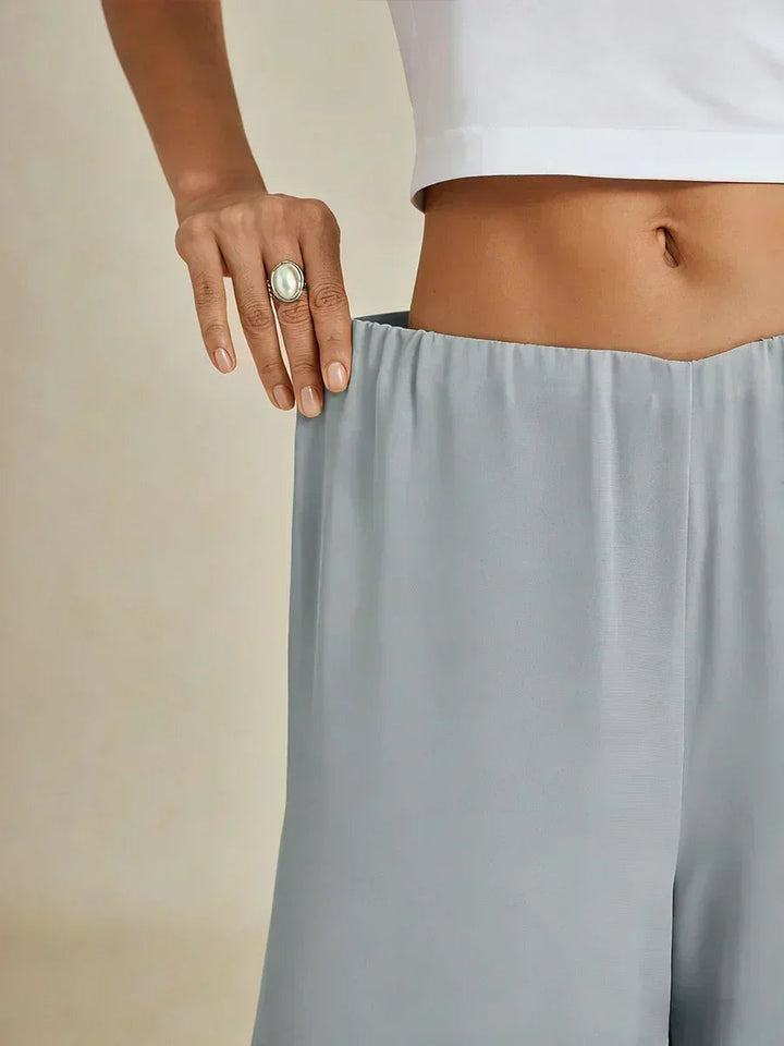 Pantaloni a gamba dritta con lunghezza cropped e sovrapposizione in chiffon