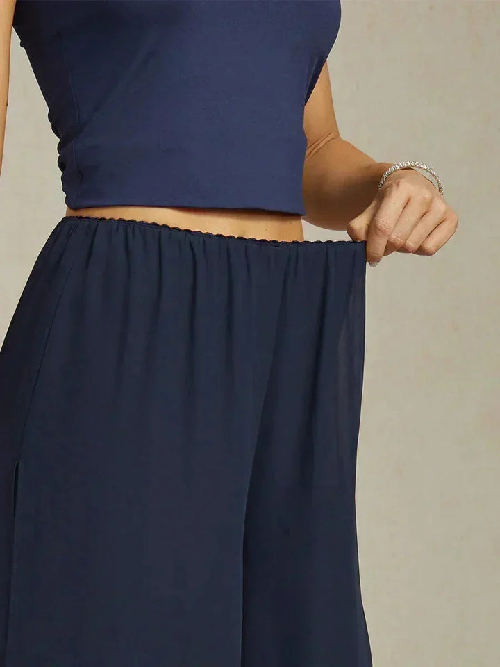 Pantaloni a gamba dritta con lunghezza cropped e sovrapposizione in chiffon