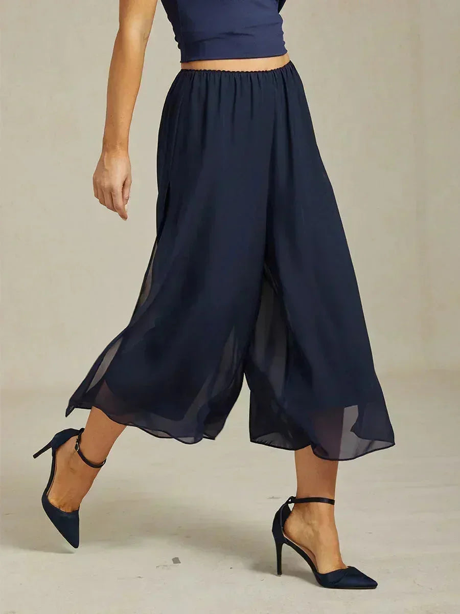Pantaloni a gamba dritta con lunghezza cropped e sovrapposizione in chiffon